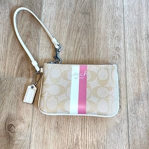 Classic Coach wristlet with logos